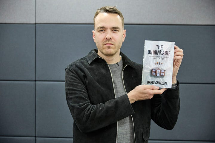 David Challen holding a copy of The Unthinkable